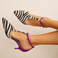 Emerson – Zebra pattern and spiked toe low stilettos